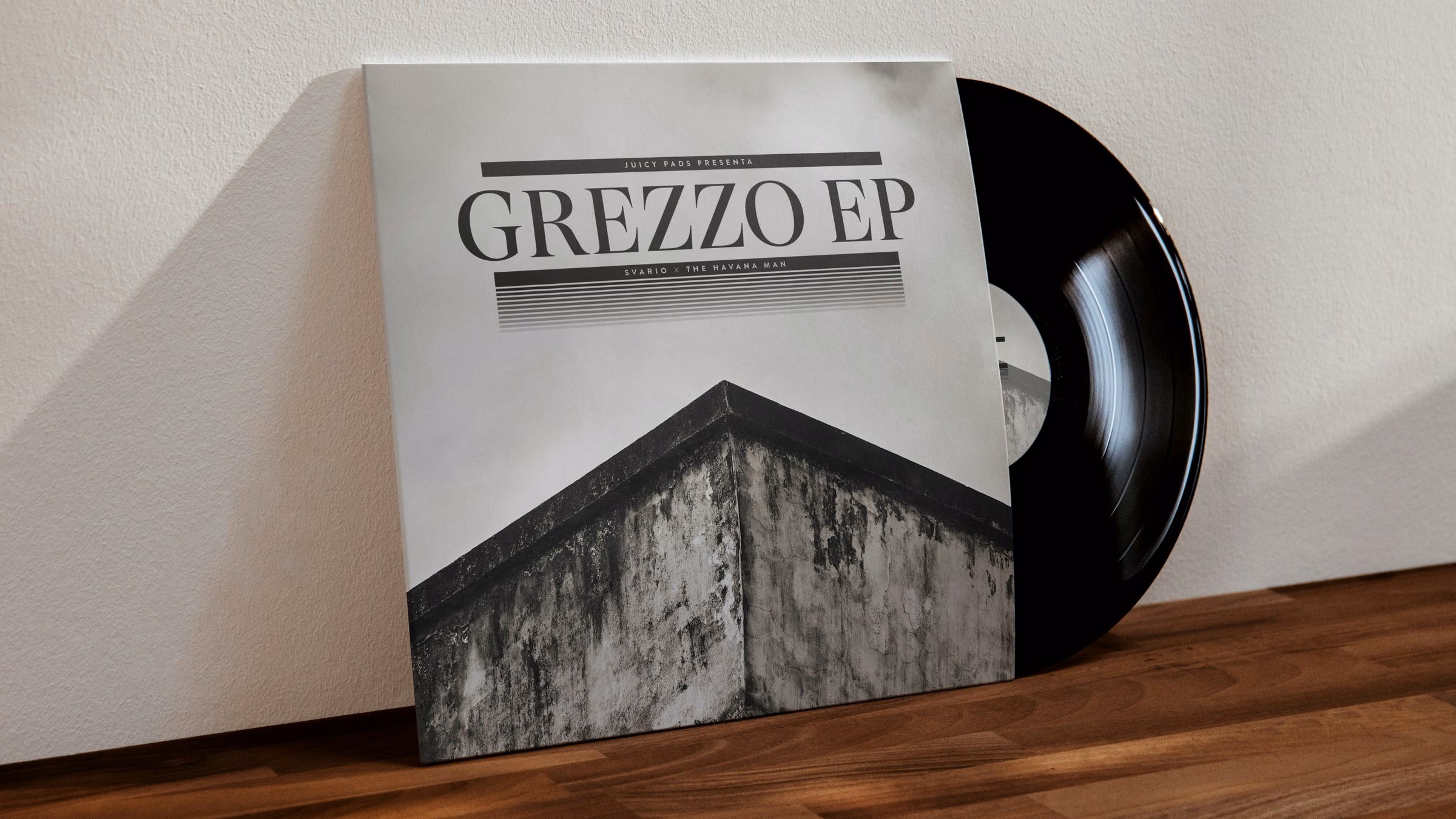 Grezzo EP by Svario and The Havana Man on vinyl, leaning against the wall