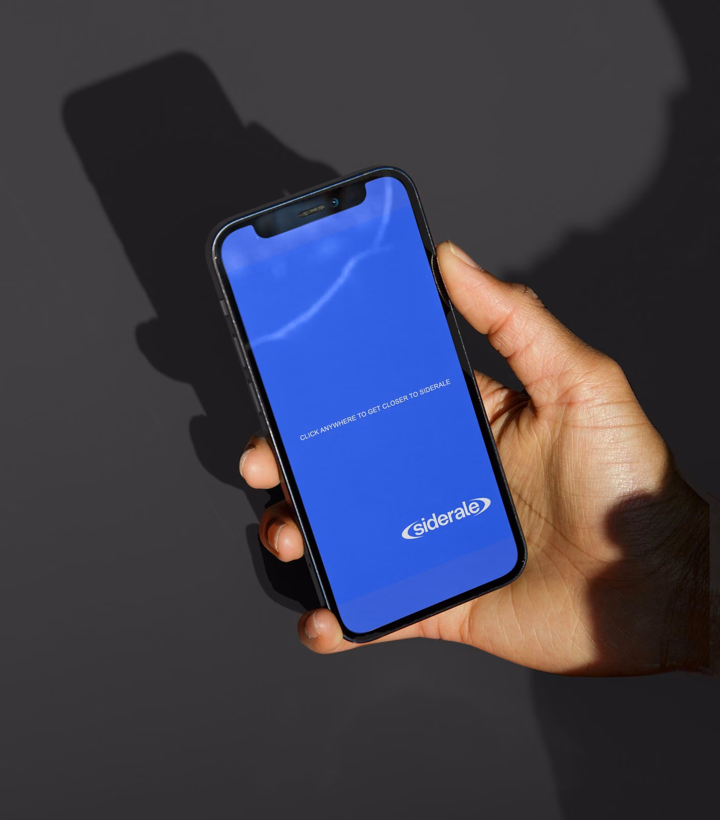 siderale.ch on a phone, blue home page