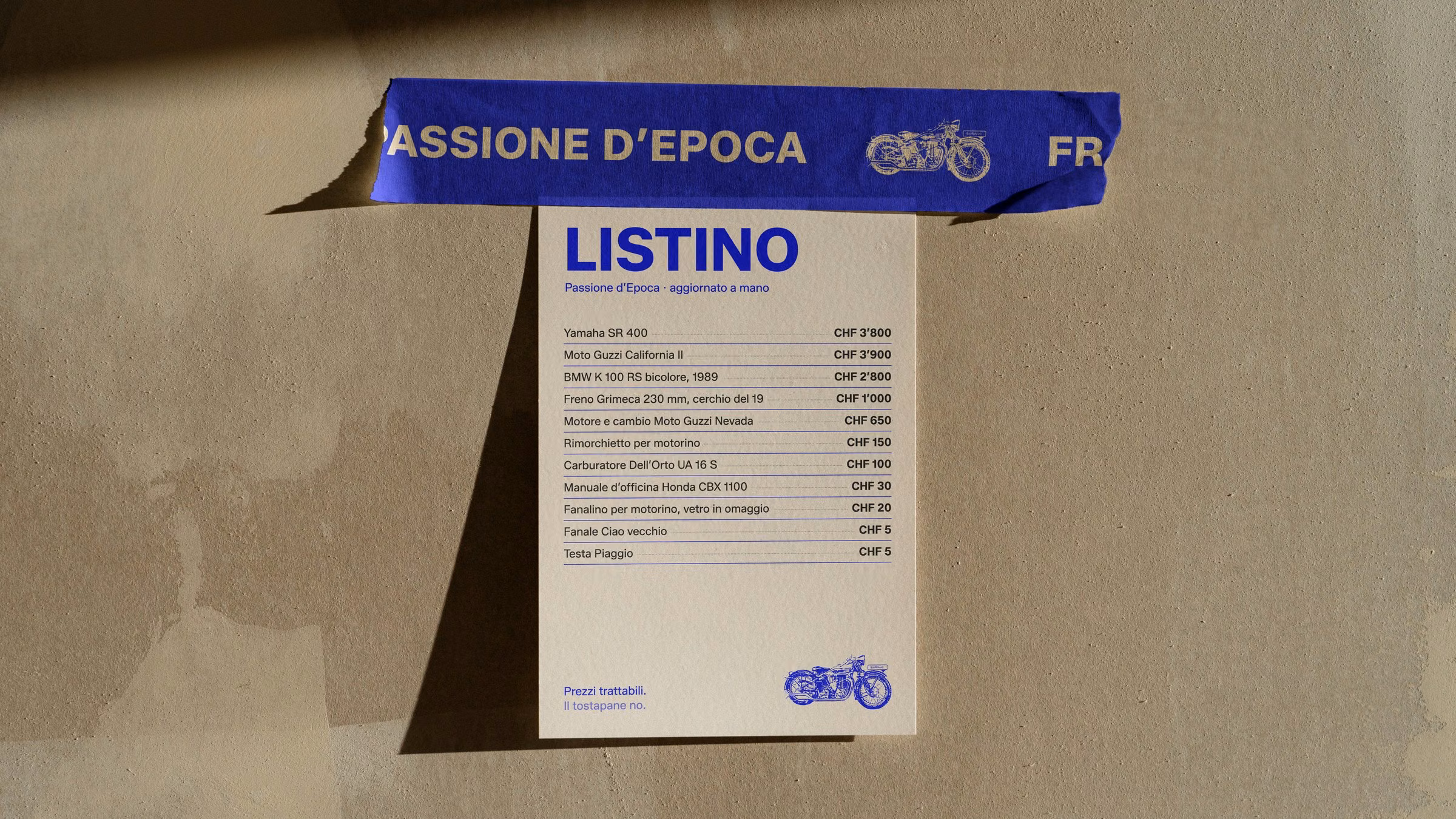 The Passione d’Epoca price list taped to the wall with blue tape, from the Yamaha SR 400 to a Piaggio head for CHF 5