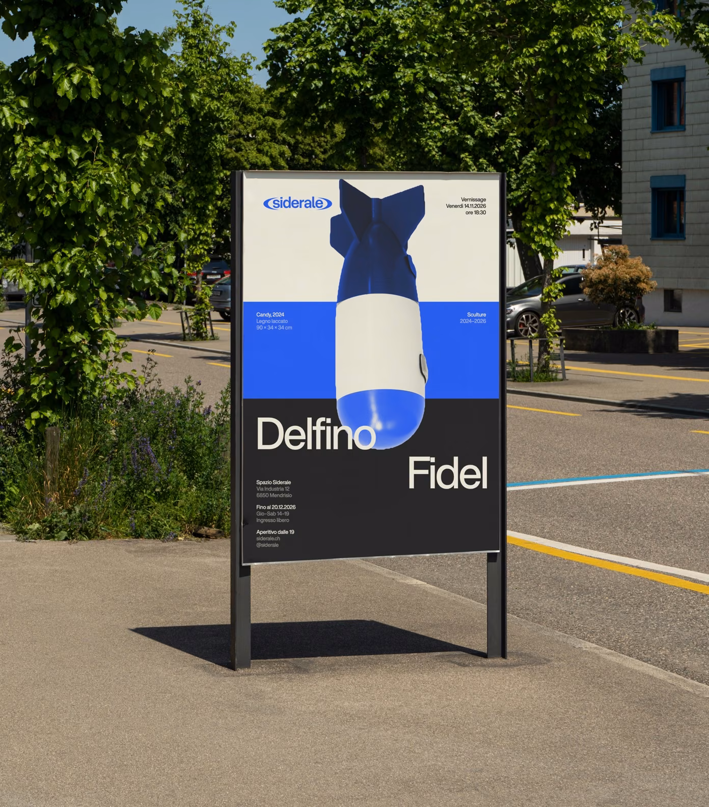 Siderale poster for Delfino Fidel’s vernissage on a street billboard: his Candy bomb falls through warm white, blue and dark grey