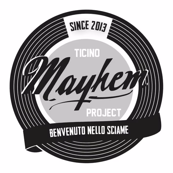 Circular black and gray logo with text 'Since 2013', 'Ticino Mayhem Project', and 'Benvenuto Nello Sciame' in Italian.