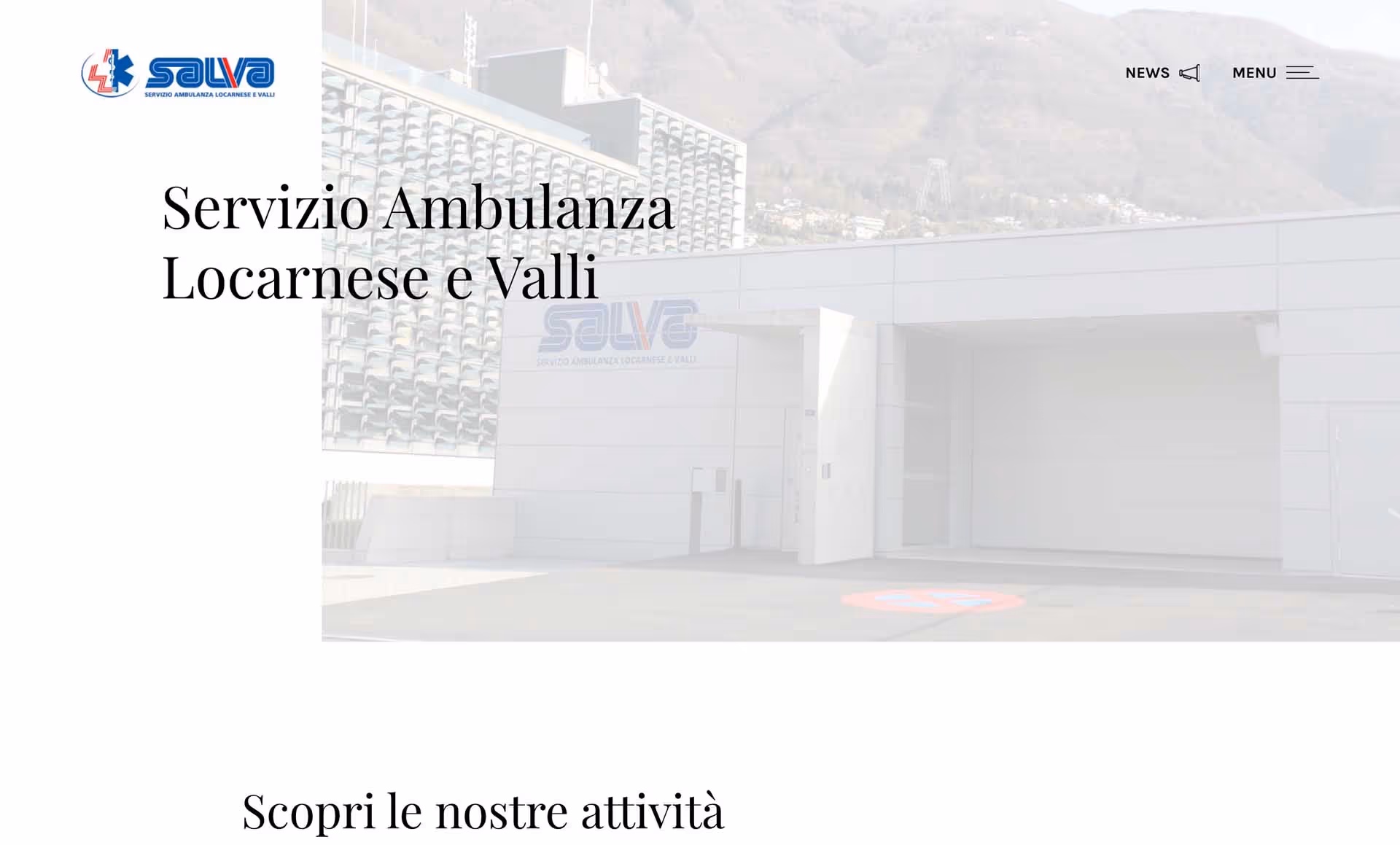 Building entrance with SALVA Servizio Ambulanza Locarnese e Valli logo and text on a white background.