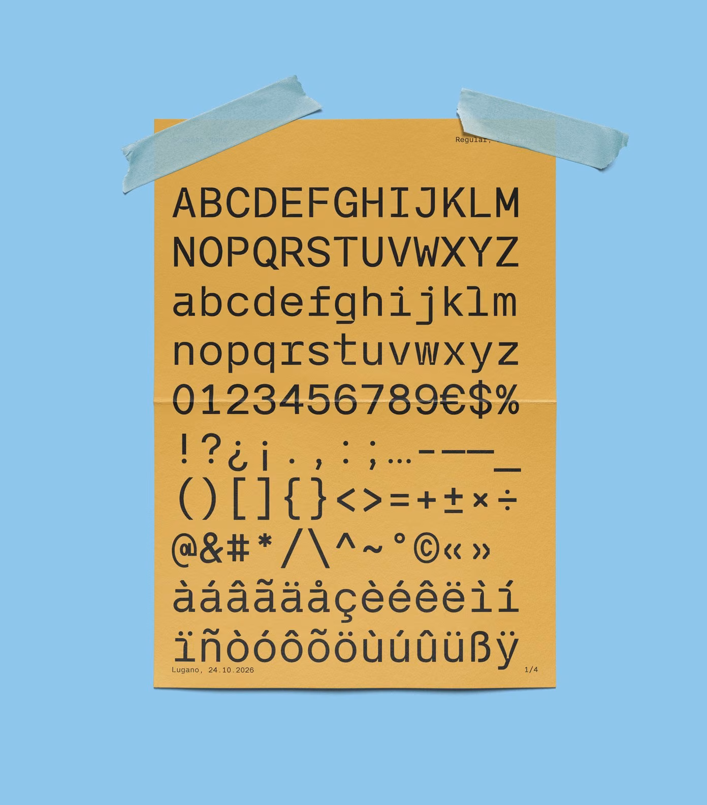 The full character set of Strambo Mono on a mustard sheet taped on light blue